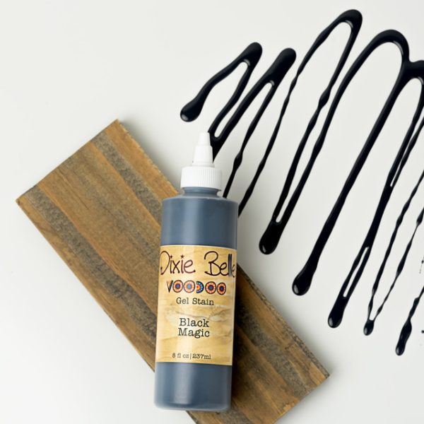 8 oz bottle of Dixie Belle VooDoo Gel Stain in Black Magic, a deep rich black wood stain with a smooth velvety finish, water-based and fast-drying for furniture and home décor projects.