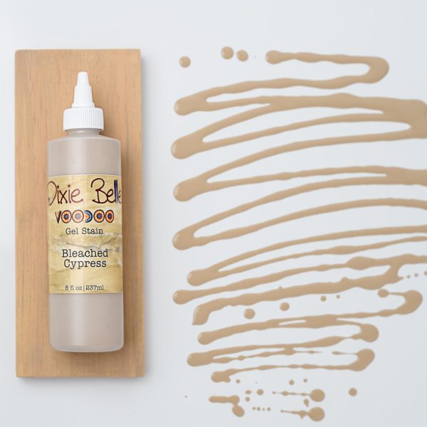 8 oz bottle of Dixie Belle VooDoo Gel Stain in Bleached Cypress, a faded weathered grey wood stain with pale wood undertones, water-based and fast-drying for furniture and home décor projects.