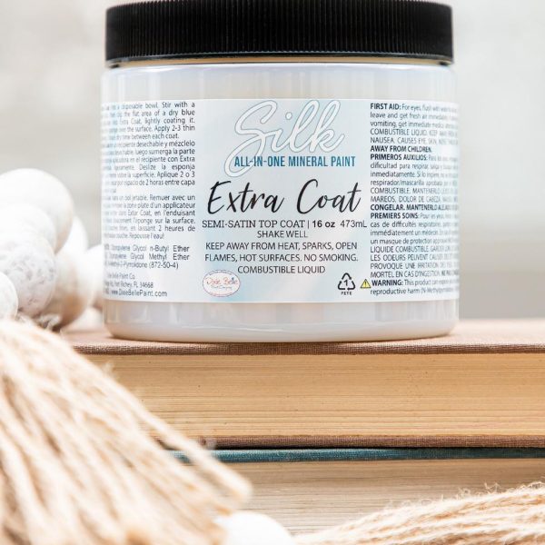 Dixie Belle Extra Coat clear polyacrylic with a semi-satin finish used on a painted furniture surface.