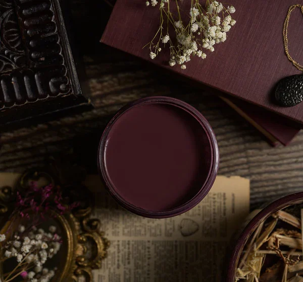 “Close-up of Apothecary Chalk Mineral Paint showing smooth matte texture on wood furniture.”