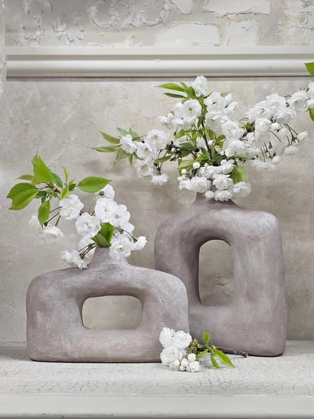 Decorative brown wide vase with textured surface for living room styling